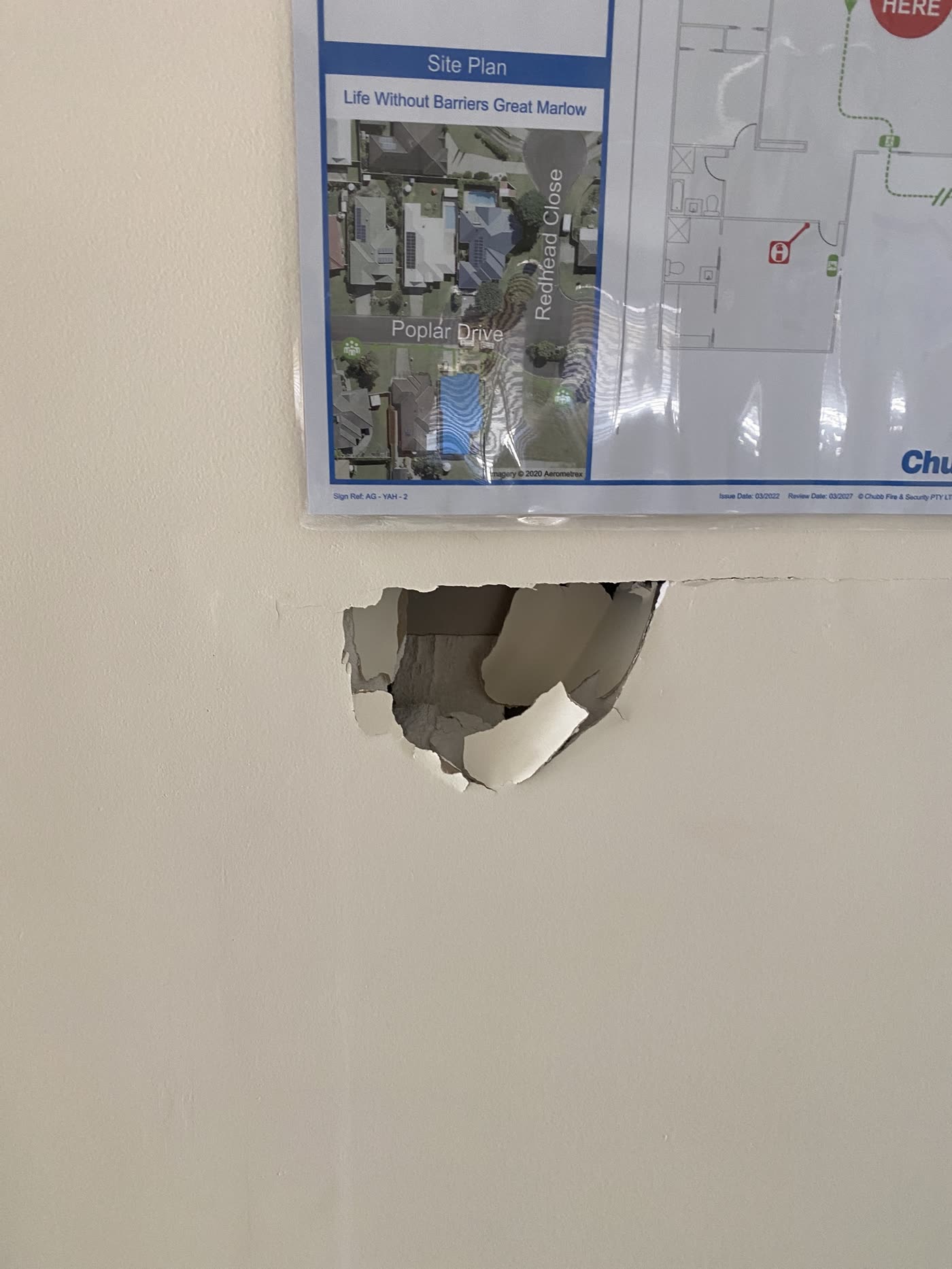 A damaged plasterboard wall