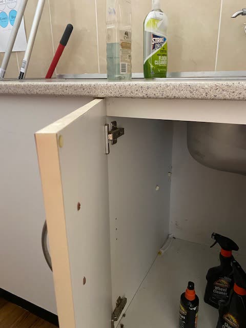 An old lock on a laundry door
