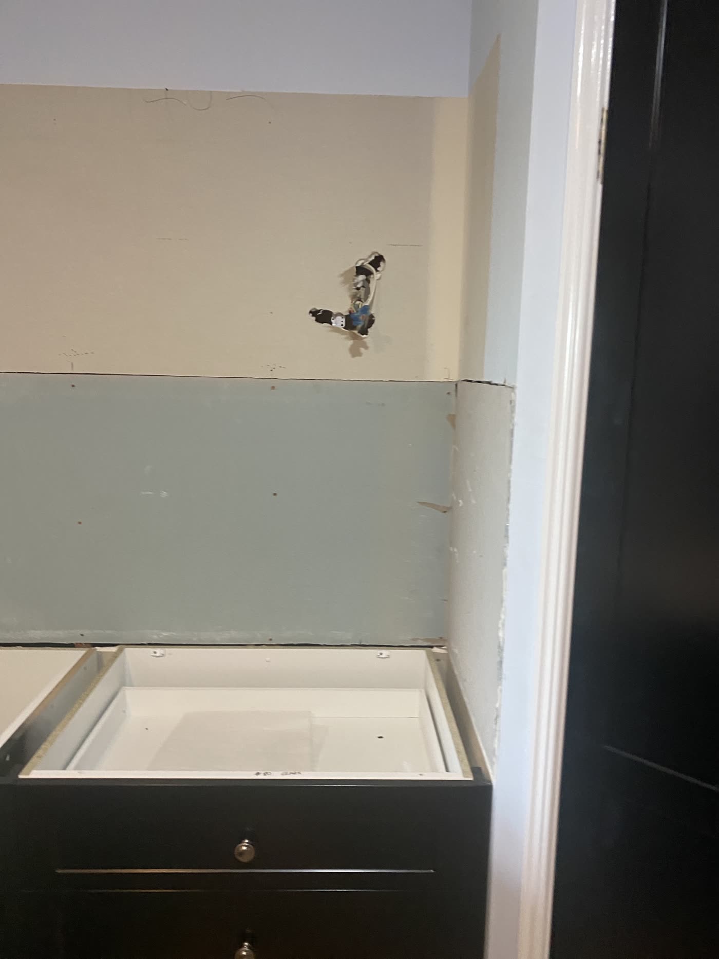 A kitchen wall before the splashback went in